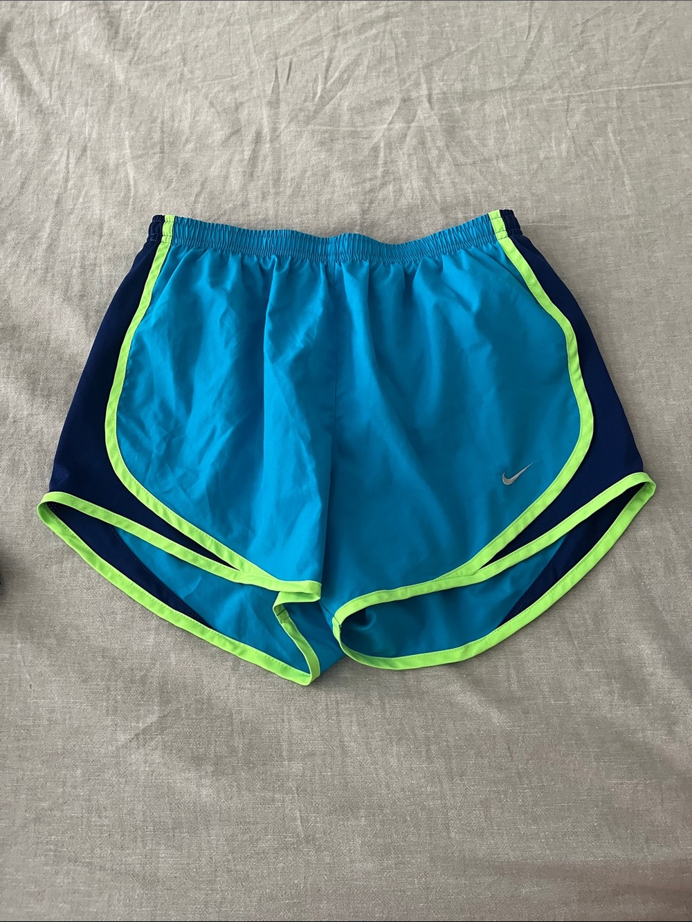Nike Women's Blue Athletic Shorts with Neon Green Trim